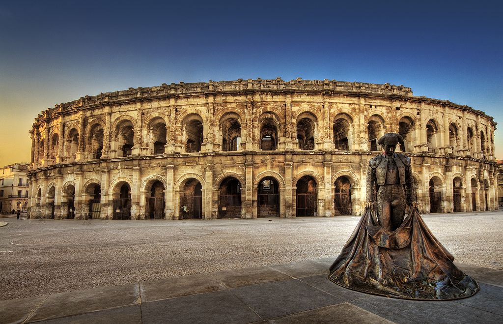 arènes nimes flambeau